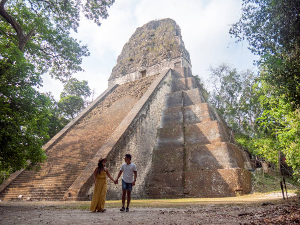 istock Couple sightseeing the Tikal ruins 1768567695