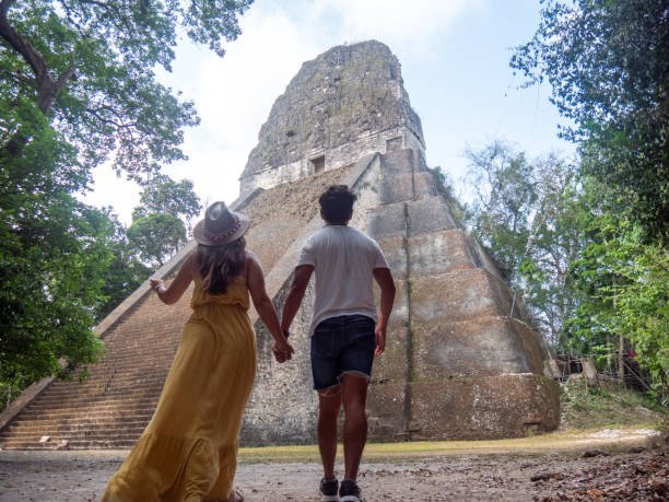 istock Couple sightseeing the Tikal ruins 1768568201