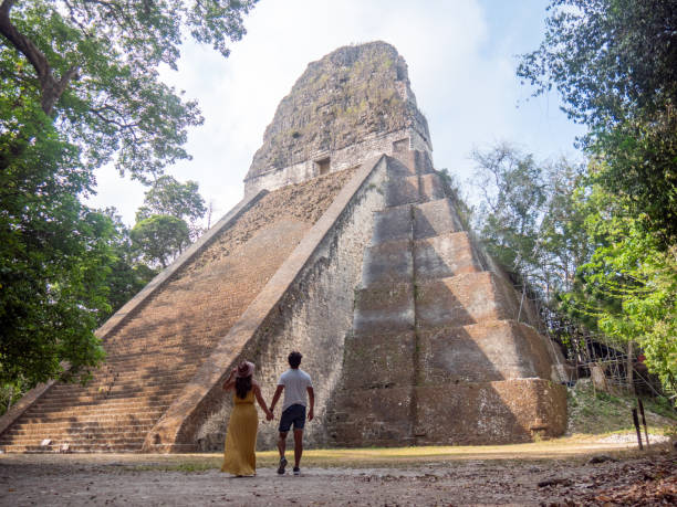 istock Couple sightseeing the Tikal ruins 1768568233