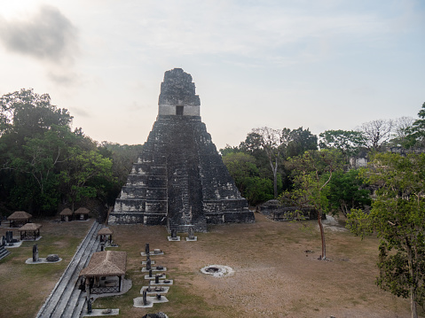 Sunny day, the temple stands in the middle of the rainforest