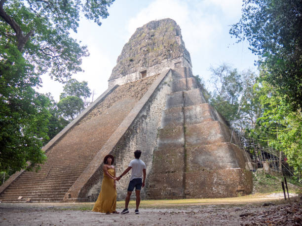 istock Couple sightseeing the Tikal ruins 1768568259