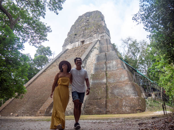 istock Couple sightseeing the Tikal ruins 1768568260