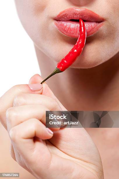 Young Woman With Chili Pepper Isolated On White Stock Photo - Download Image Now - Adult, Adults Only, Beautiful People