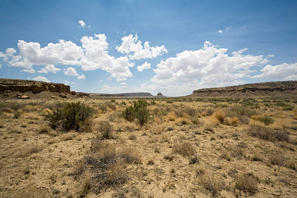 Desert Mesa Scene Horizontal picture of a typical desert mesa scene. The late afternoon winds blow the dust and clouds toward the horizon. chaco culture national historic park stock pictures, royalty-free photos & images