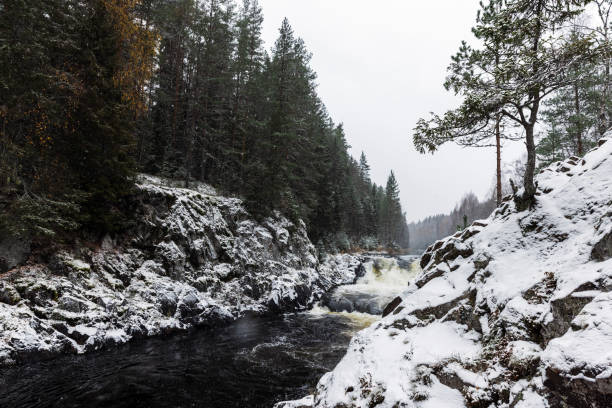 istock Kivach Falls on a cold cloudy winter day. Karelian landscape 1768581285