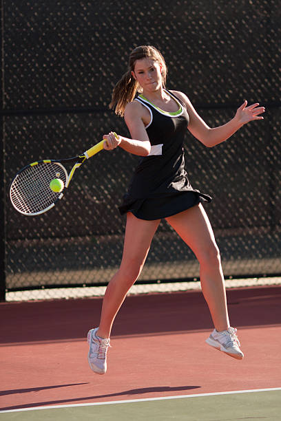 istock Female Tennis Player Hits Forehand 176858221