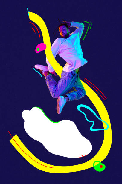 istock Poster. Contemporary art collage. Dancer painted in neon filter, light performing in breakdance in air against dark mode background surrounded colorful elements. 1768588110