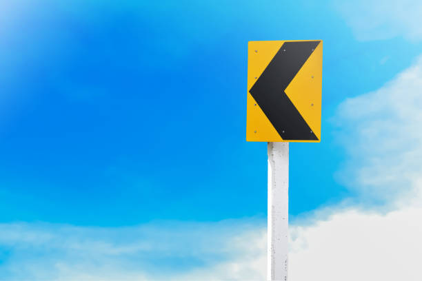 Yellow off road traffic sign on blue sky. Horizontal composition with copy space. Clipping path is included.