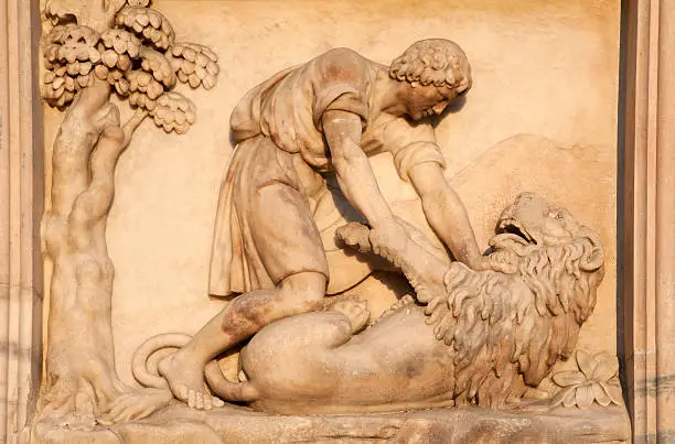 Milan - detail from facade of Duomo - Samson battle with a Lion