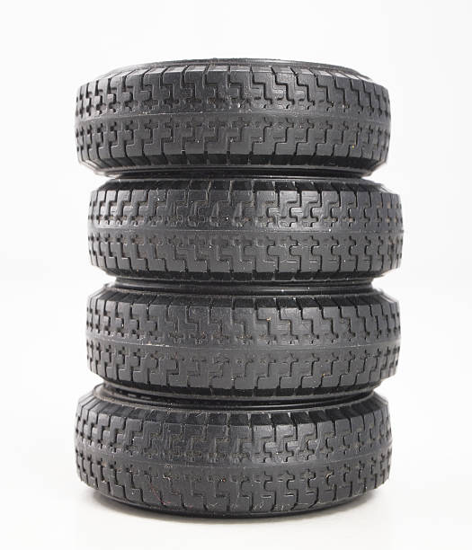 istock four tires isolated on white background 176859382