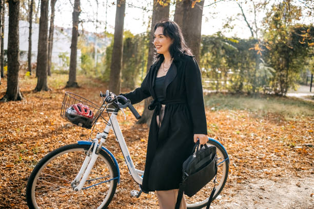 istock Young woman using bike for going to work 1768598269