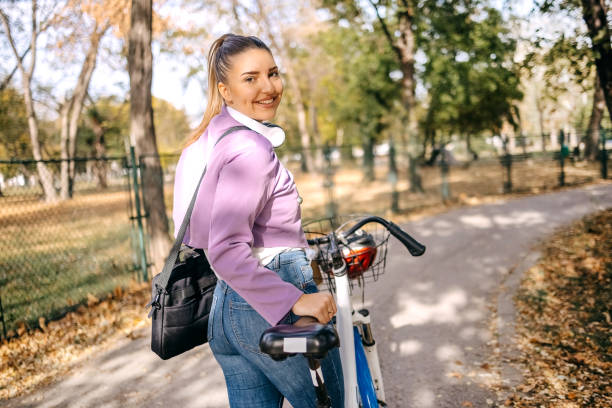 istock Young woman using bike for going to work 1768598852