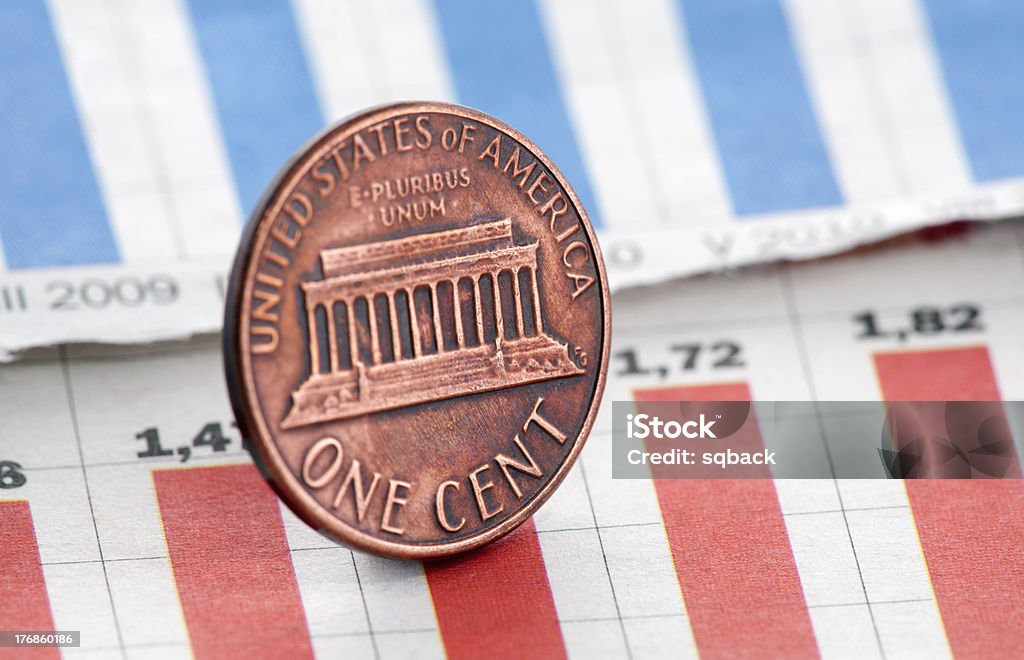 American one cent on newspaper chart Banking Stock Photo