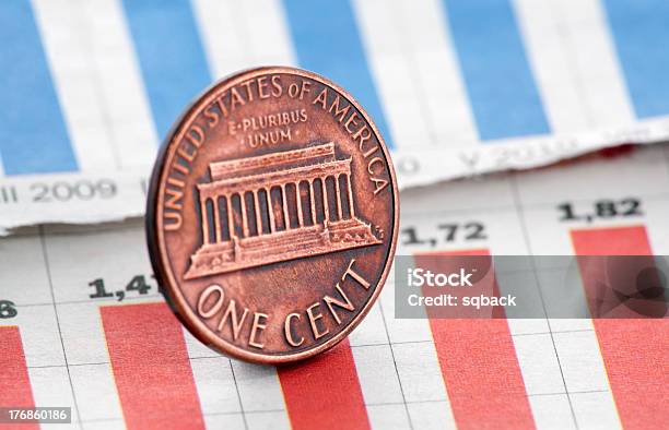 American One Cent On Newspaper Chart Stock Photo - Download Image Now - Banking, Blue, Business