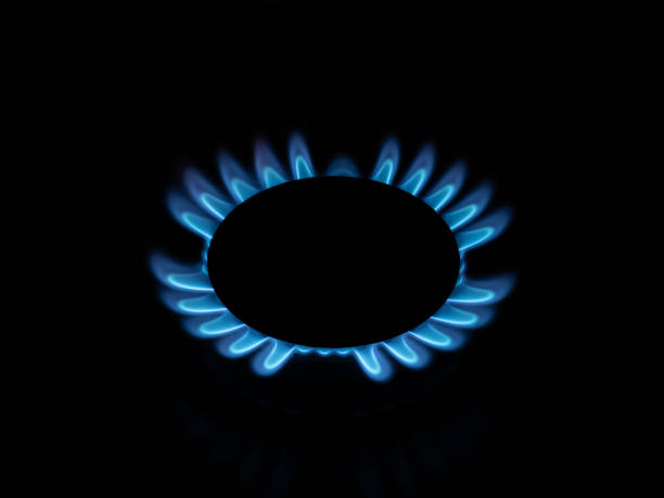 istock Kitchen gas stove burner flame isolated against black background 1768602101