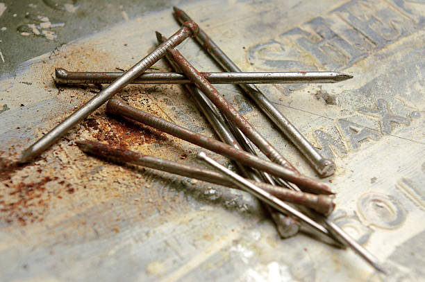 pile of nails stock photo