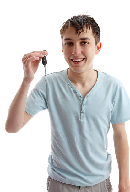 istock Happy teen with car key 176860348