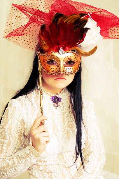 istock woman at masquerade mask 176861794