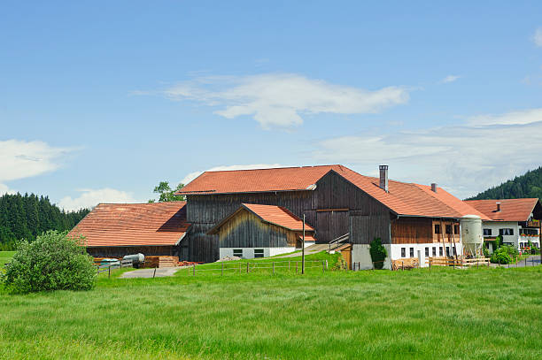 rural scenery with beautiful farm house stock photo