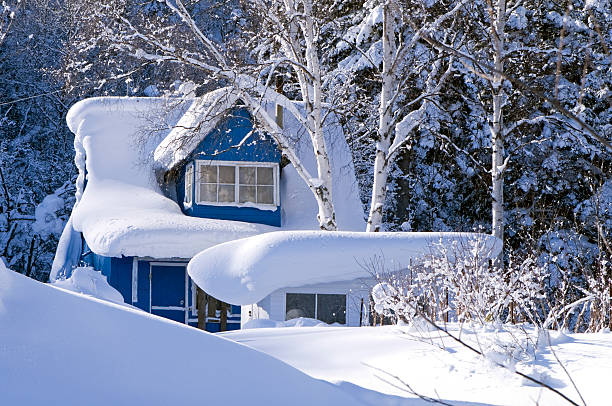 dacha in  snowdrift Winter landscape with a snow-covered country house deep snow stock pictures, royalty-free photos & images