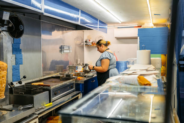 istock Food Service Worker Preparing Gyros At A Diner 1768636609