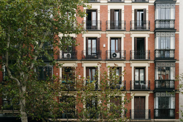 Brick facade of an apartment building in Madrid, Spain