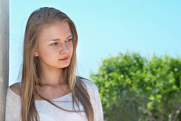 istock Pretty blond girl outdoors 176864703