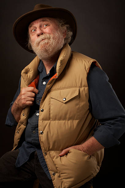 istock Senior outdoors man with hand in pocket, looking up 176864829