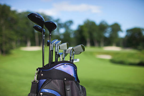 istock Golf bag and clubs against defocused green background 176865148