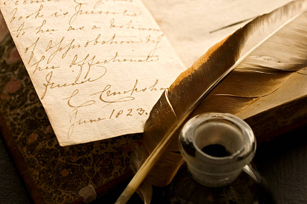 istock Old book with feather and inkpot 176865167