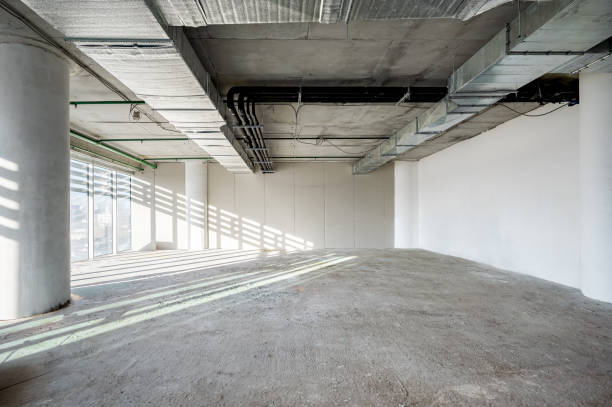 istock An empty room of an office space under construction. Panoramic windows. Modern office 1768654925