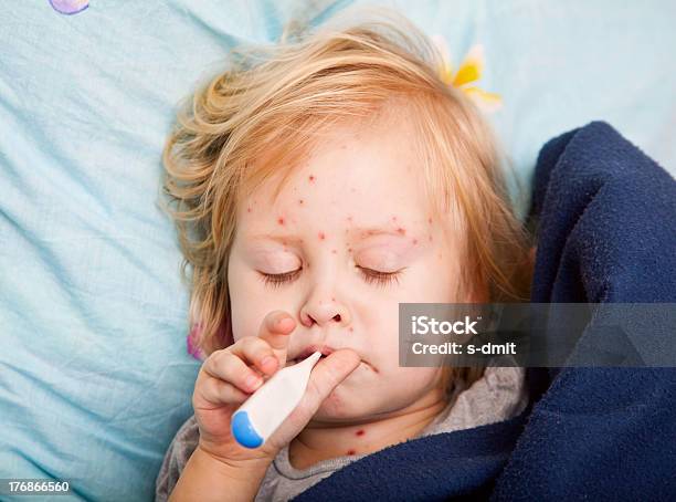 Young Girl With Chickenpox Taking Her Temperature Stock Photo - Download Image Now - Chickenpox, Child, Bed - Furniture