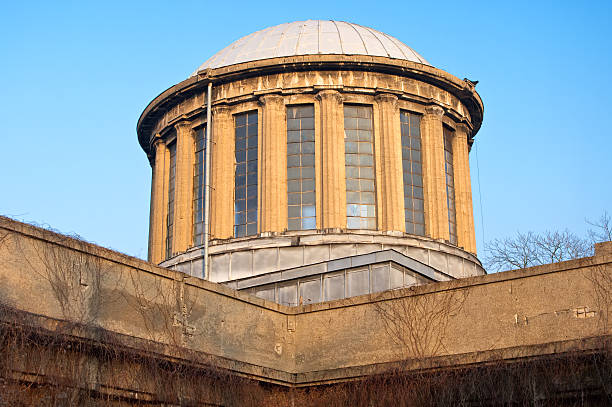 Old concrete construction with dome and big windows