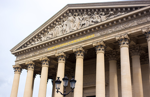 Paris, France: La Madeleine Church Facade Corinthian Columns Close-Up. Situated in the 8th arrondissement, the Neoclassical church was completed in 1842.