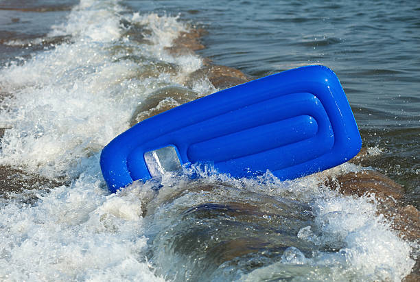 istock Inverted inflatable mattress in the sea wave. 176868466