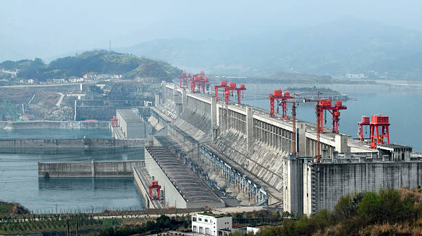 Aerial view of the Three Gorges Dam in China the Three Gorges Dam at Yangtze River in China at evening time yangtze river stock pictures, royalty-free photos & images