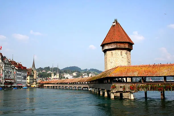 "Digital photo of the famous chapel-bridge in Lucerne in switzerland. The bridge was build in the year 1365, it is the oldest and longest (204 m) bridge with a roof in europe"