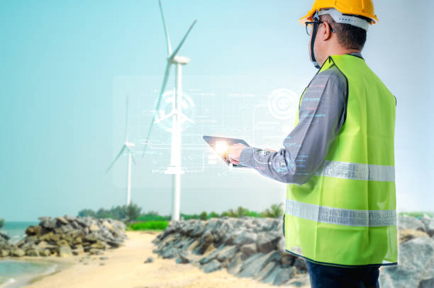 istock Skilled engineer harnesses power of renewable energy by sustainable, alternative sources such as wind turbines, making positive impact on industrial sector, reducing traditional electricity generators 1768707249