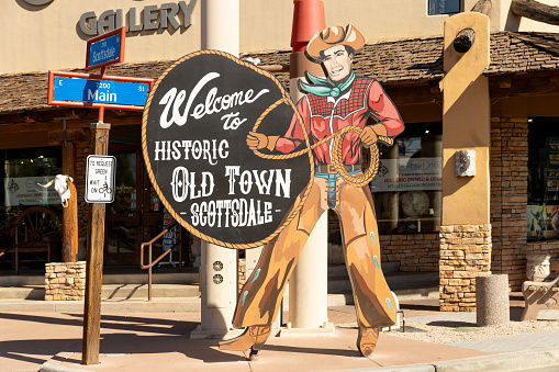 Scottsdale, AZ, USA - October 26, 2023: Old Town Scottsdale is famous for their shopping, art galleries, restaurants, and bars and clubs with their iconic sign located along every street.