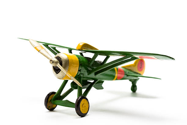 Green model airplane with propeller A handmade airplane toy airplane stock pictures, royalty-free photos & images