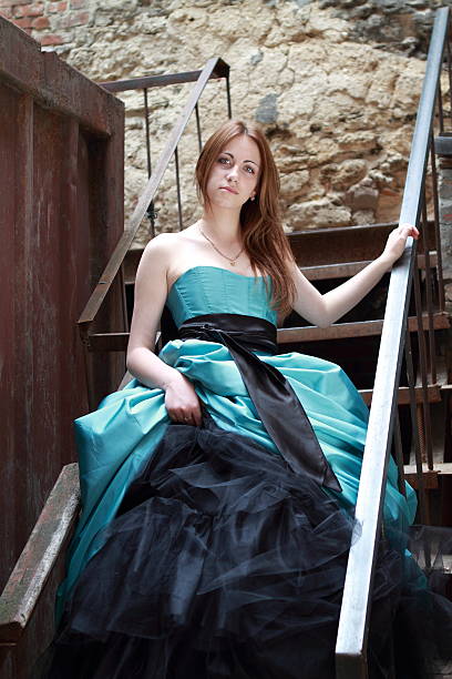 istock Red haired girl on the stairs 176871392