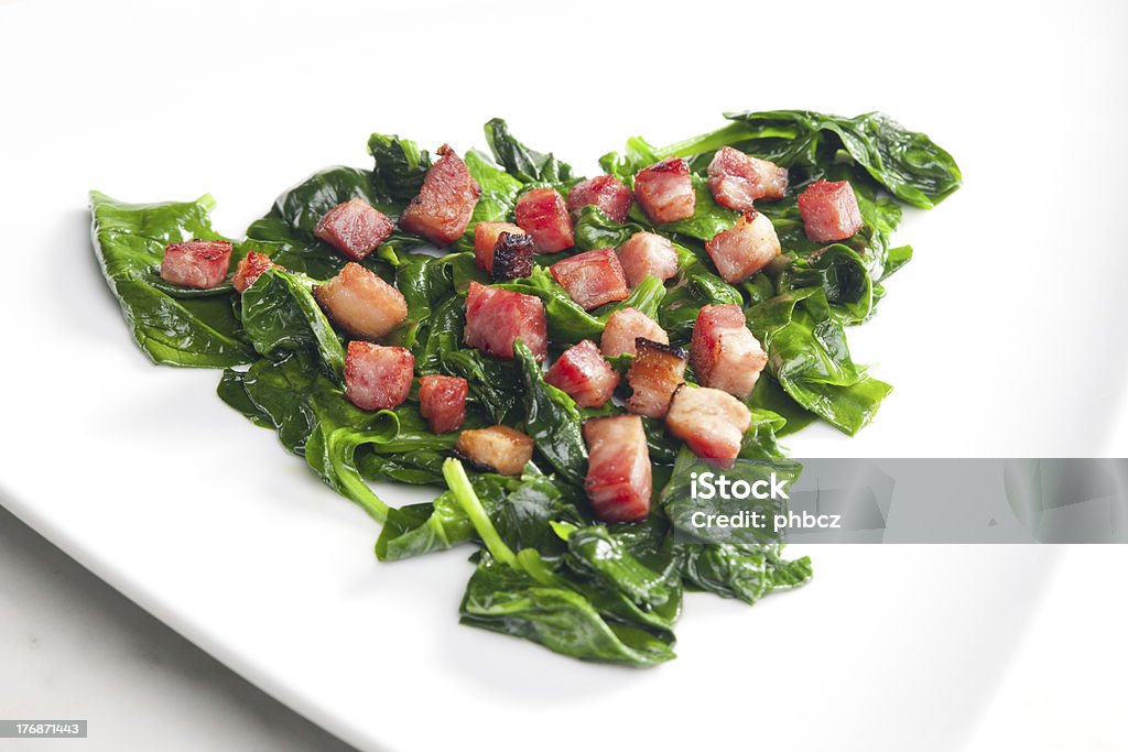 fried spinach fried spinach with bacon Bacon Stock Photo