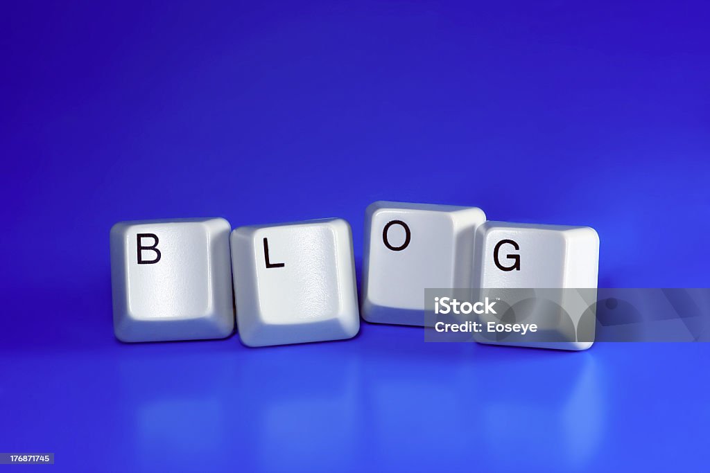 White keyboard keys on blue background spelling blog blog - keyboard keys Web 2.0 Stock Photo