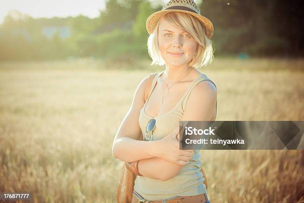 Young Woman On Wheat Field Stock Photo - Download Image Now - Adult, Adults Only, Agricultural Field