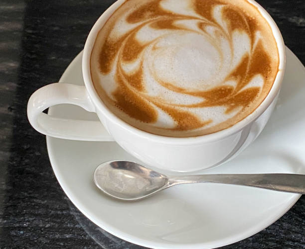 istock Homemade cappuccino cups with interesting drawings 1768719943