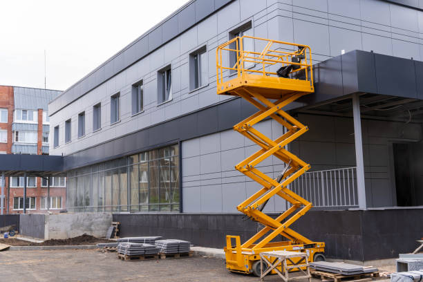 istock mobile lifting cradle. Construction scissor lift. 1768725244