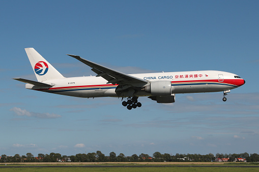 Vijfhuizen, Netherlands - August 3, 2012: China Cargo Boeing 777F with registration B-2076 on short final for runway 18R (Polderbaan) of Amsterdam Airport Schiphol.