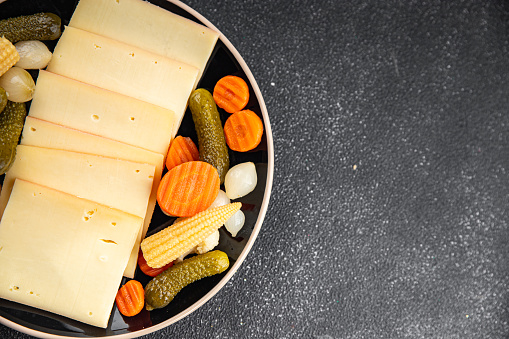 raclette cheese meal vegetable delicious healthy eating cooking appetizer meal food snack on the table copy space food background rustic top view