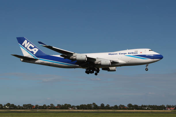 Nippon Cargo Airlines Boeing 747-400F Vijfhuizen, Netherlands - August 3, 2012: Japanese Nippon Cargo Airlines Boeing 747-400F with registration JA02KZ on short final for runway 18R (Polderbaan) of Amsterdam Airport Schiphol. nippon cargo airlines photos stock pictures, royalty-free photos & images