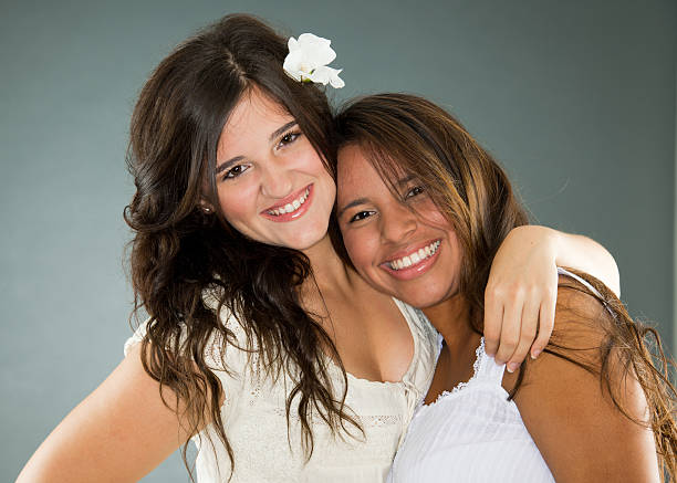 istock Beautiful Latina Women Embrase 176873723